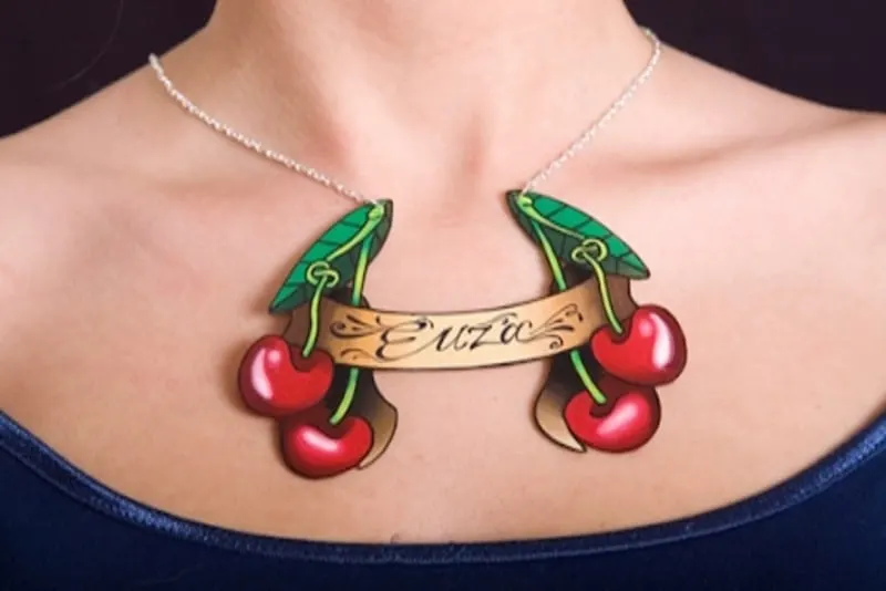 colorful necklace tattoo below neck