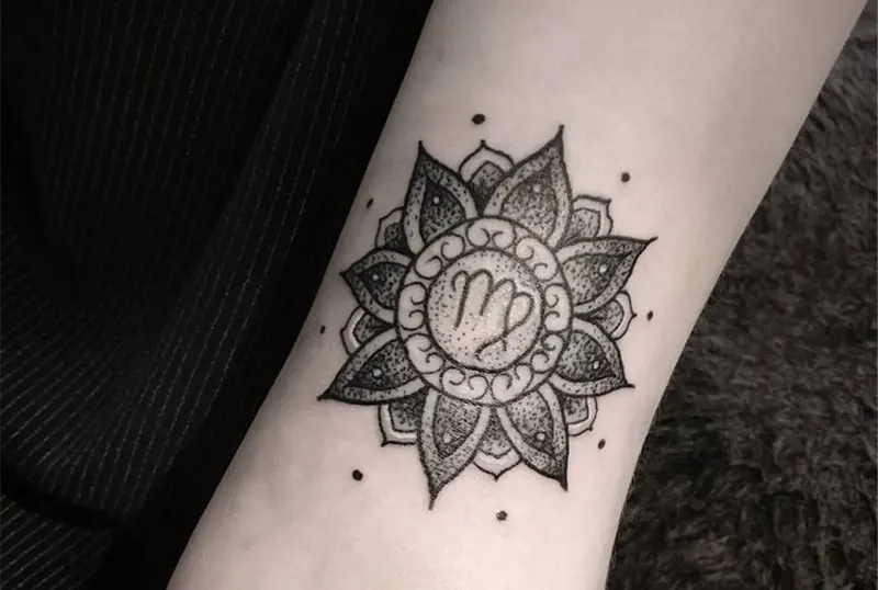pretty mandala Virgo tattoo surrounded with small dots