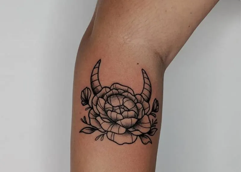 rose tattoo with bull`a horns