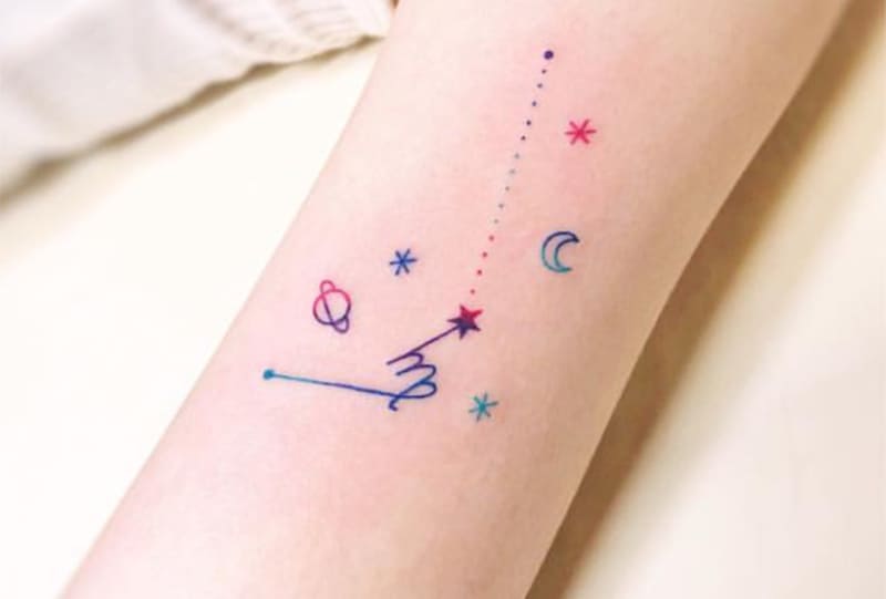 small and colorful Virgo symbol tattoo with stars