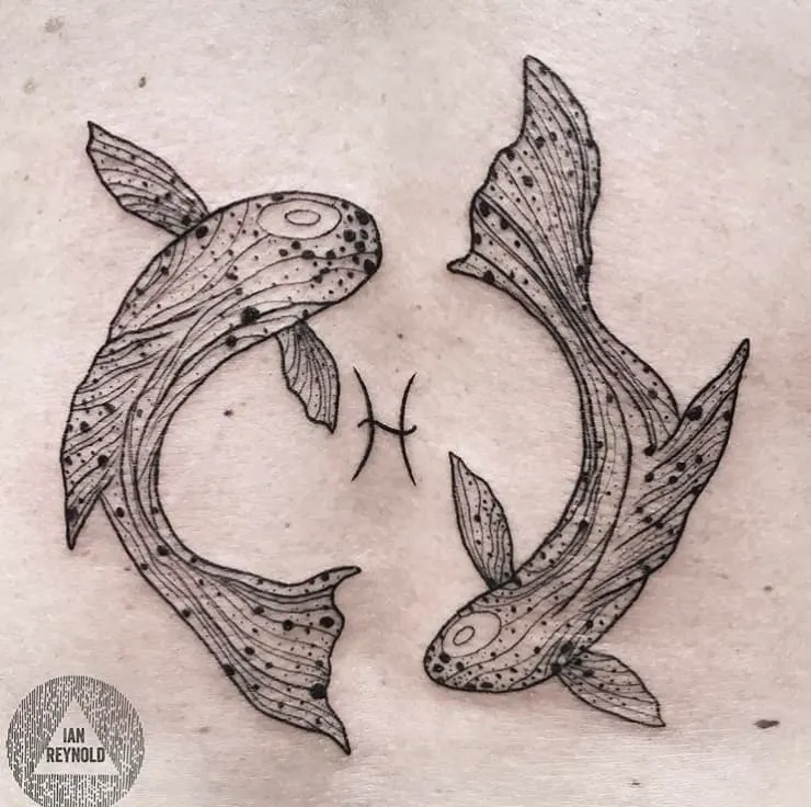 speckled pisces tattoo with zodiac symbol in the center