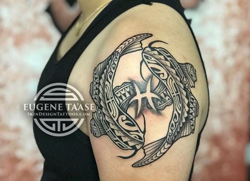 tribal pisces tattoo with zodiac symbol in the middle