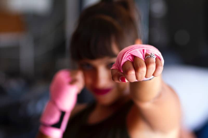 focus photography of woman's fist
