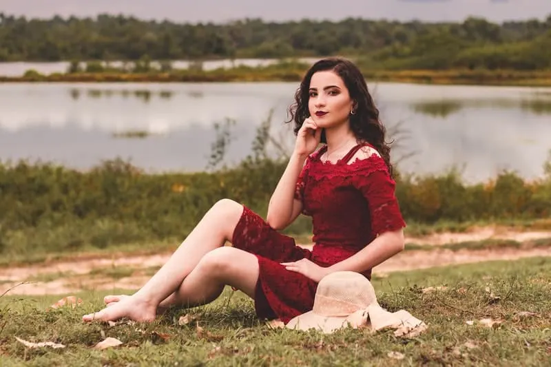 woman sitting on grass