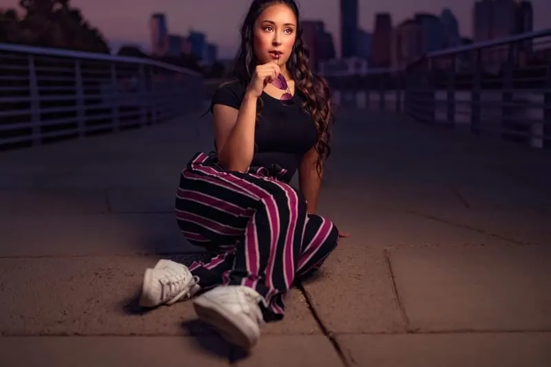 woman sitting on ground