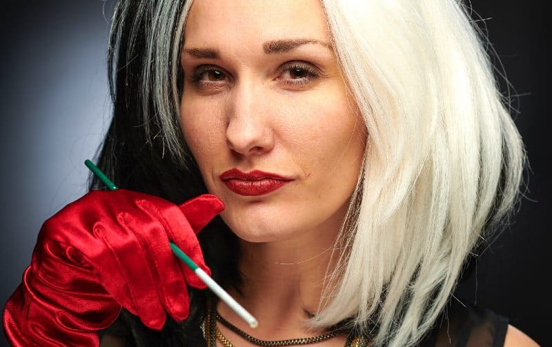 Portrait of woman wearing Cruella de vil costume