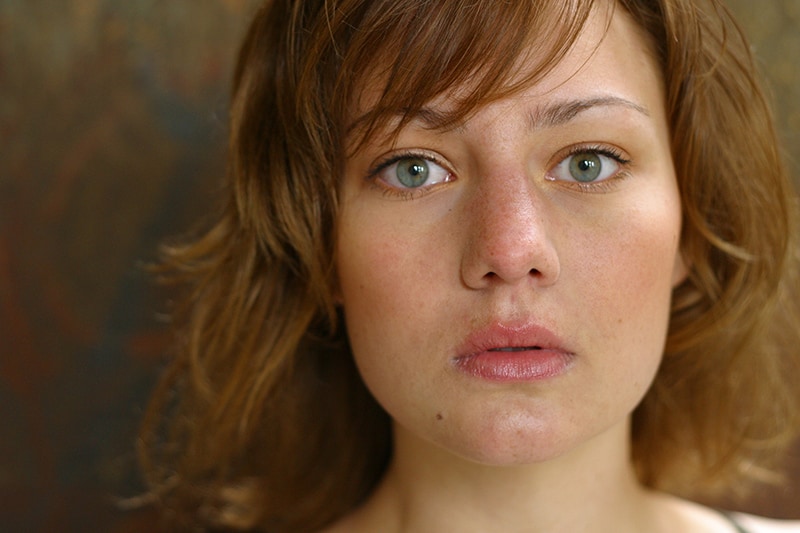 woman with blue eyes and brown hair