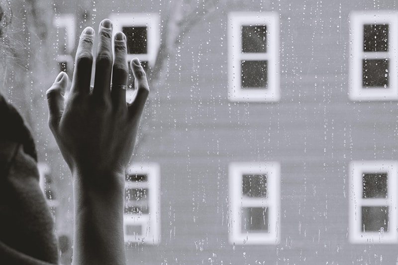 woman's right hand on glass