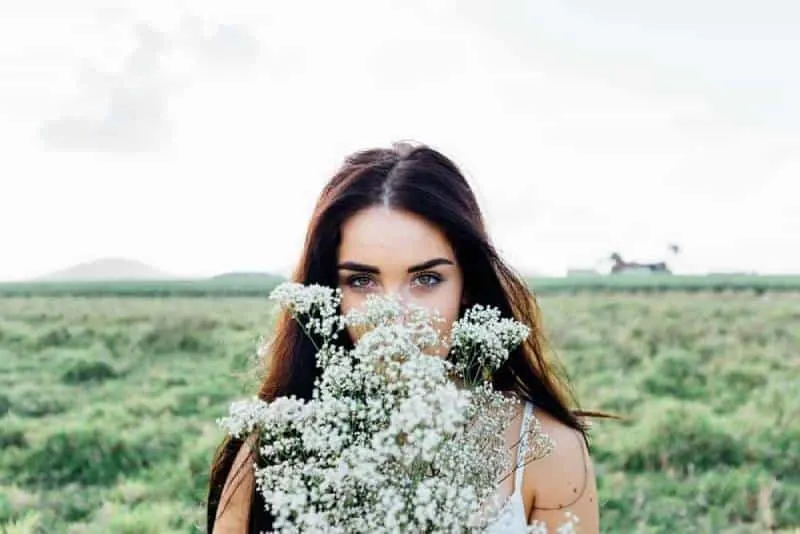 young woman flowers bouquet woman