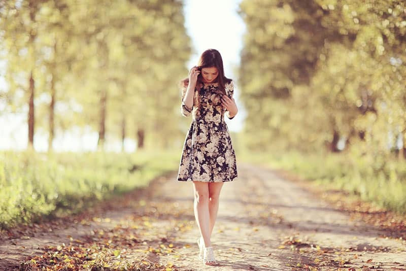 young woman walking in nature