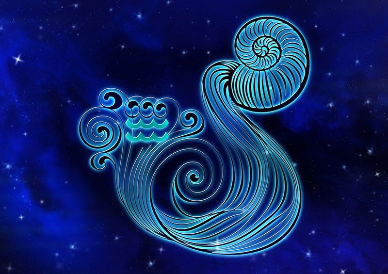 segno zodiacale acquario su sfondo blu