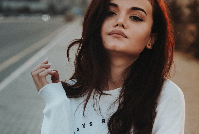 woman wearing white hoodie