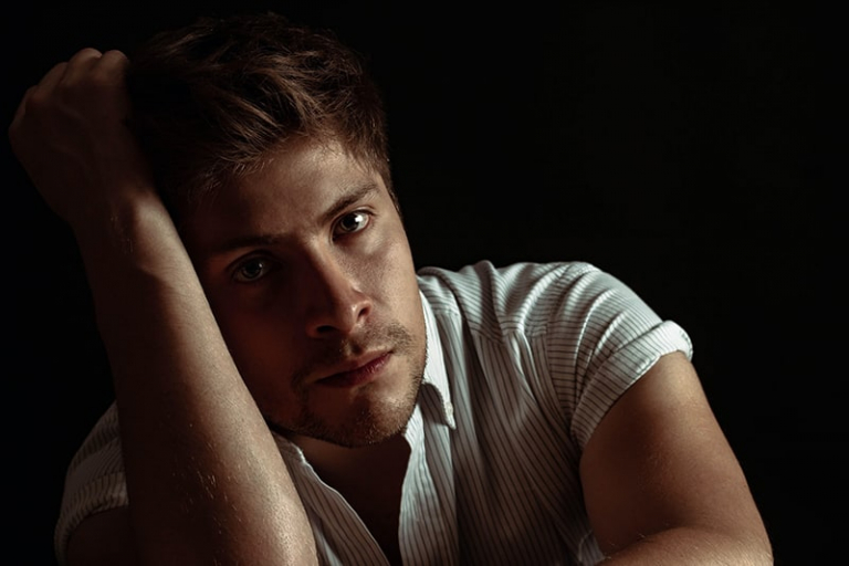 man wearing white striped shirt