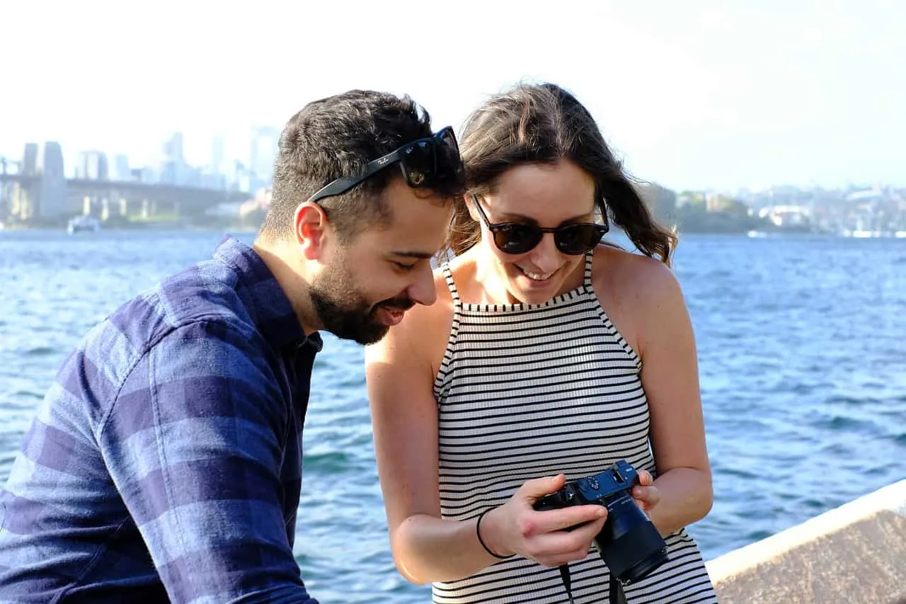 a couple in love looking at photos