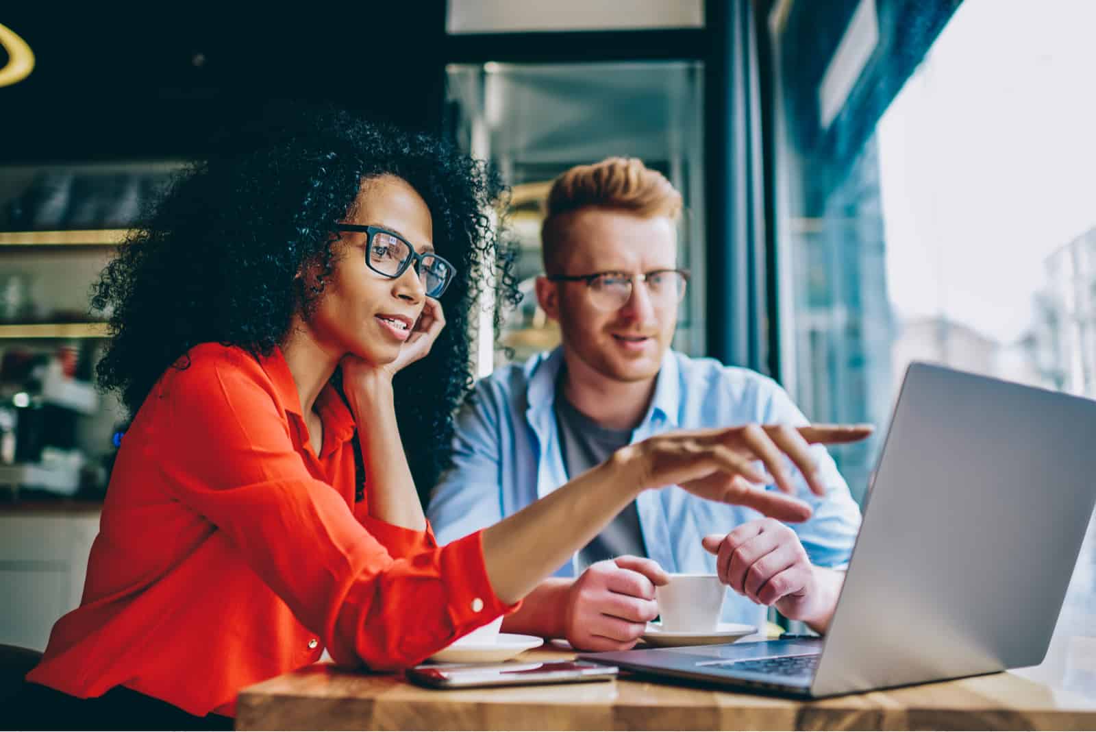 a man and a woman talking at work