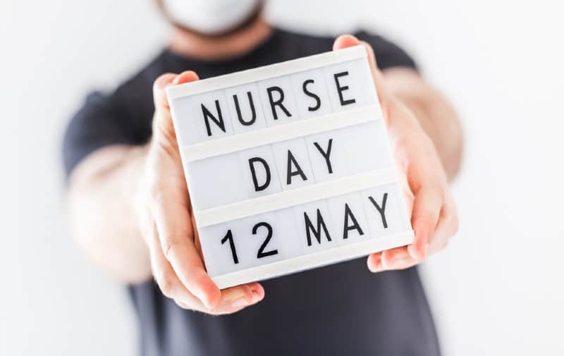 Man holding Nurse day message