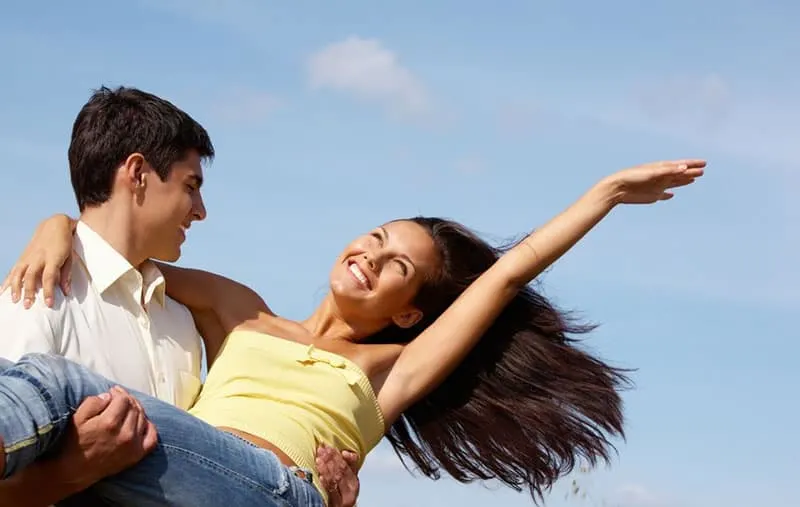 happy sweet couple man enjoying summer