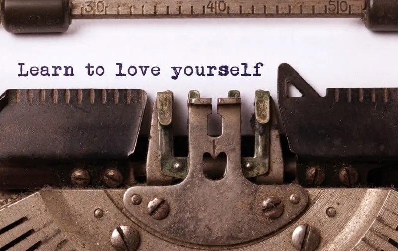 Learn to love yourself message on old typewritter