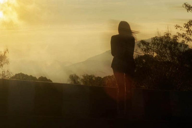 woman standing alone outside
