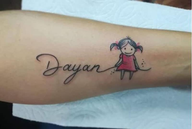 Personalized child tattoo for a mom inked in the arm