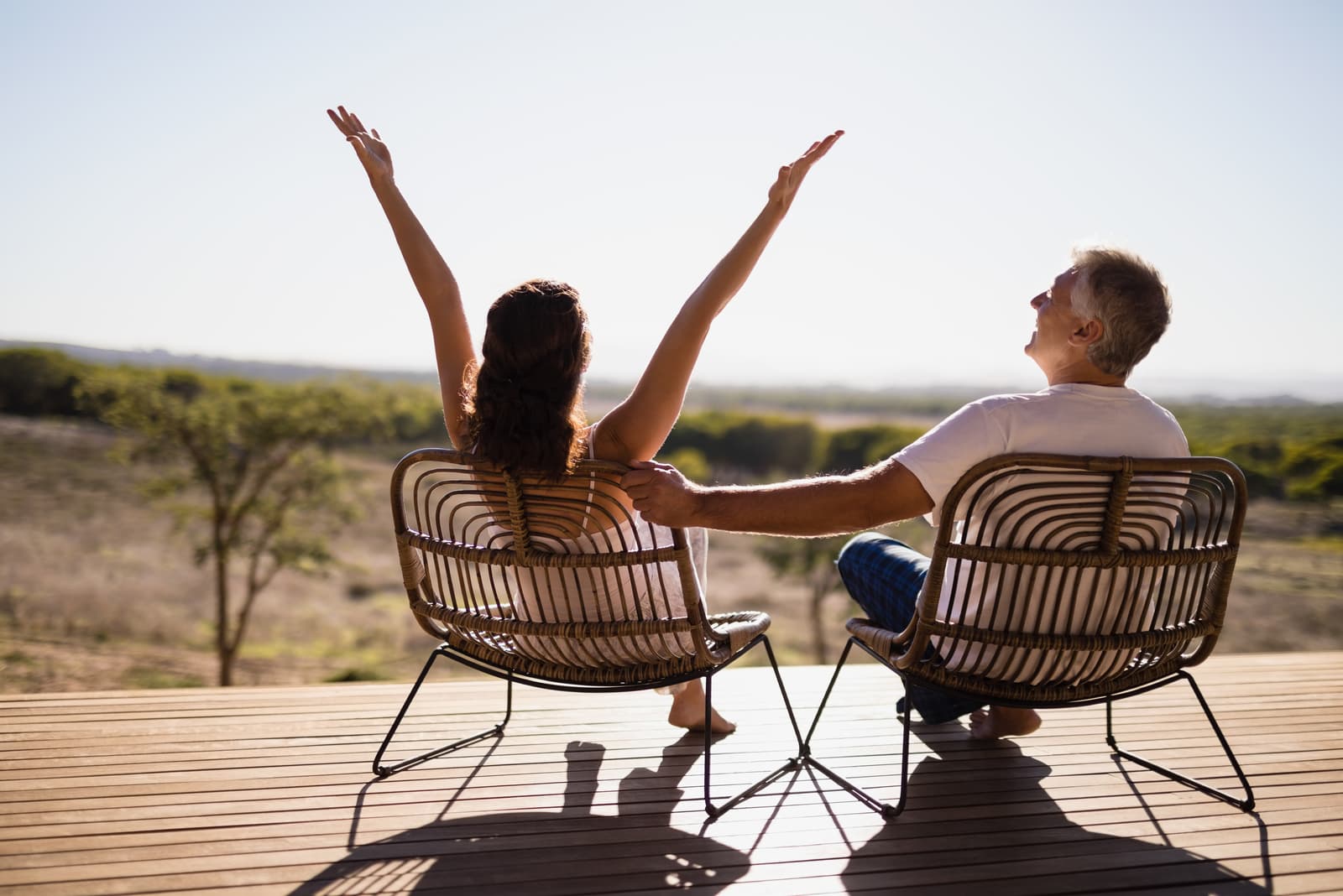 couple sitting on chairs at the resort