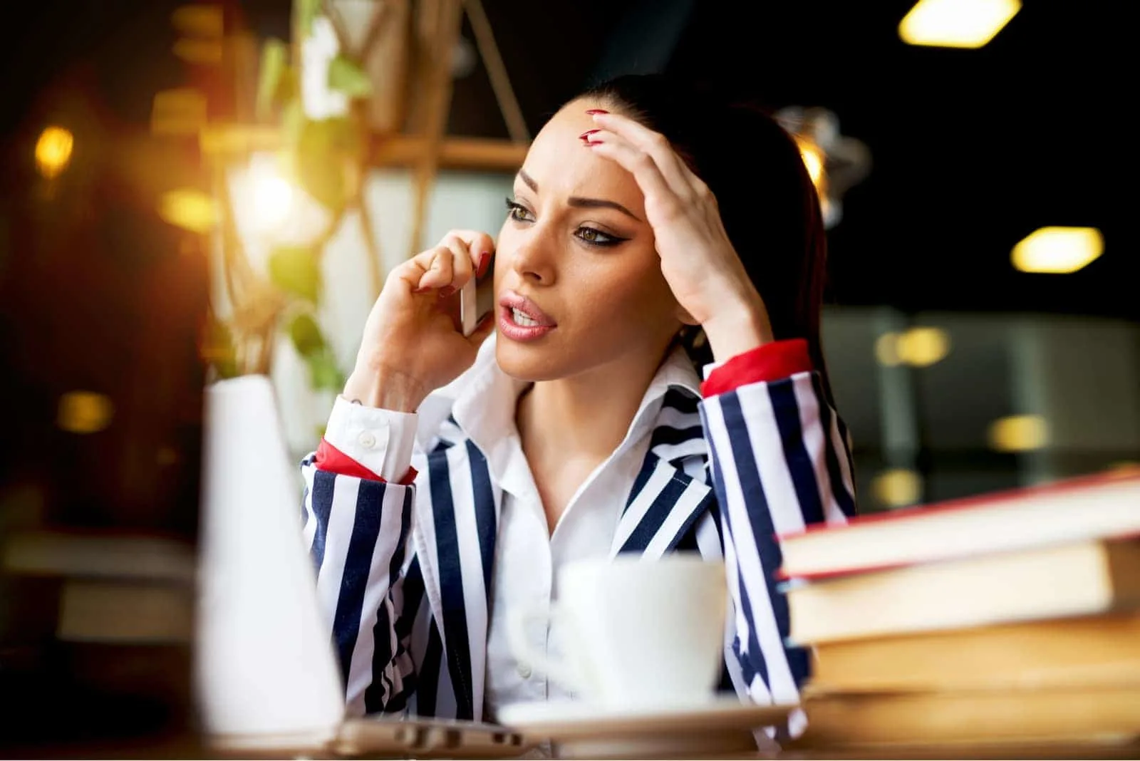 woman talking over phone being upset