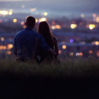 lovers man and woman against background in the night