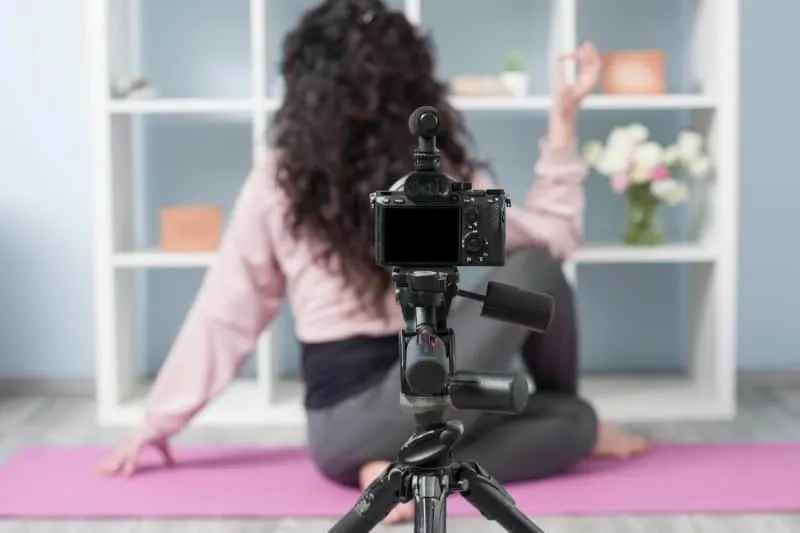 adult influencer teaching yoga on social media