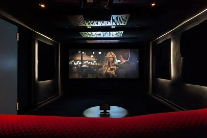 movie shown on screen in a private cinema