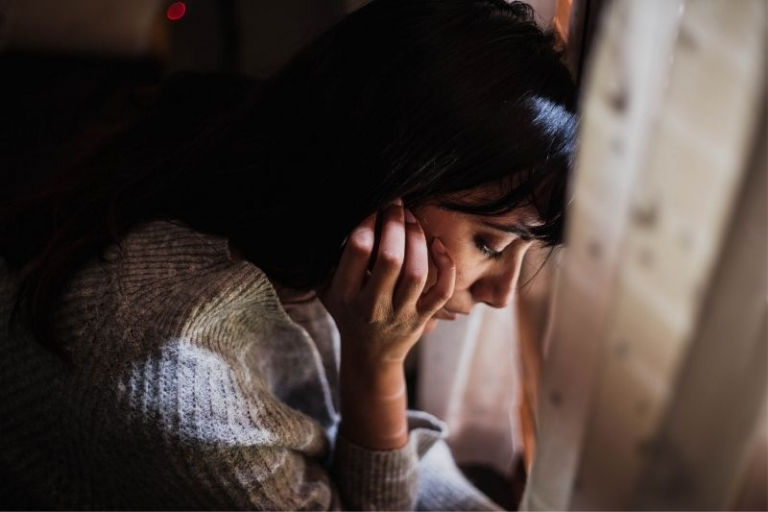 sad woman looking down