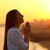 young woman praying