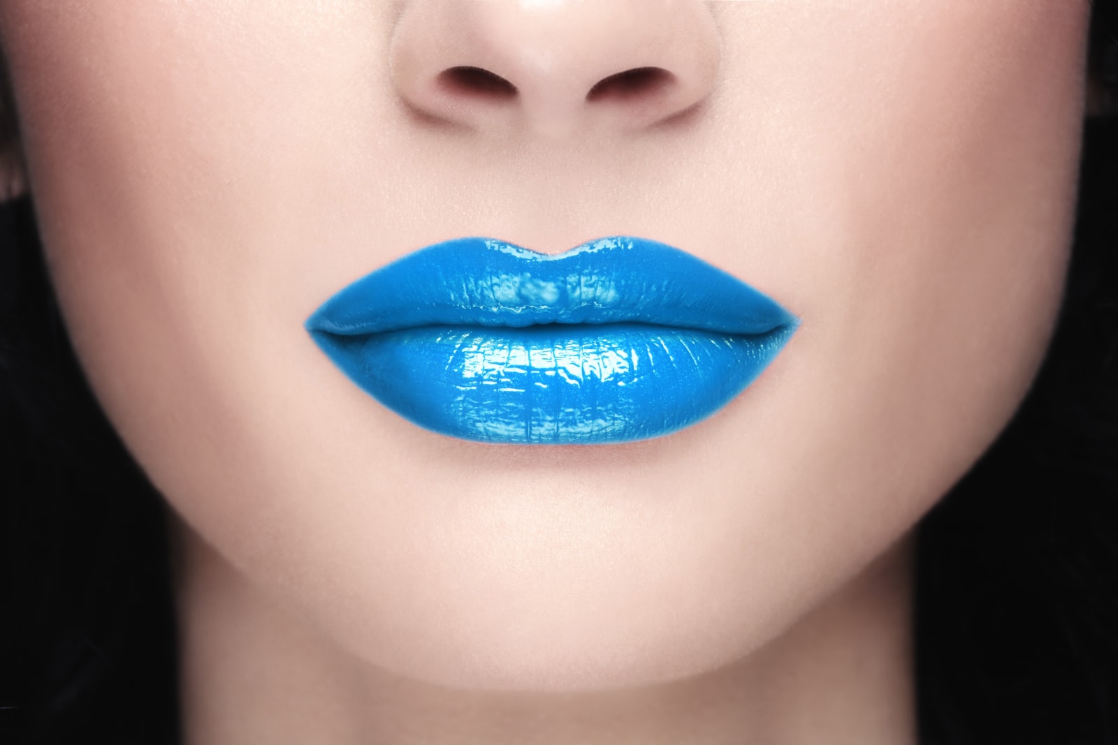 woman wearing blue lipstick