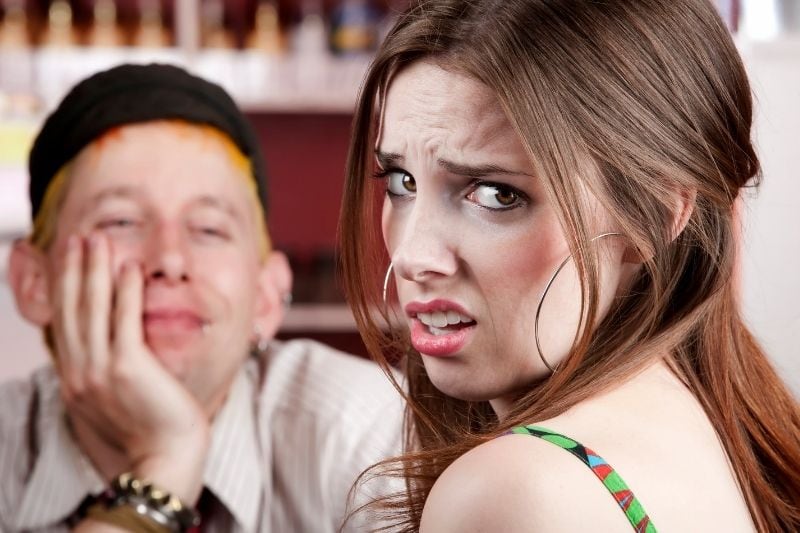 woman's bad date with a man showing exasperating expression