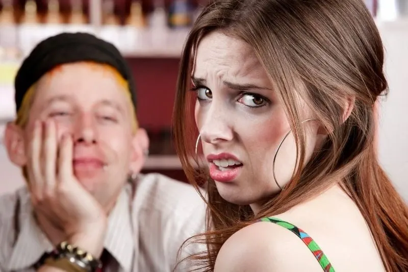 woman's bad date with a man showing exasperating expression