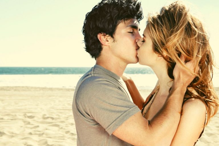 lovely couple kissing outside