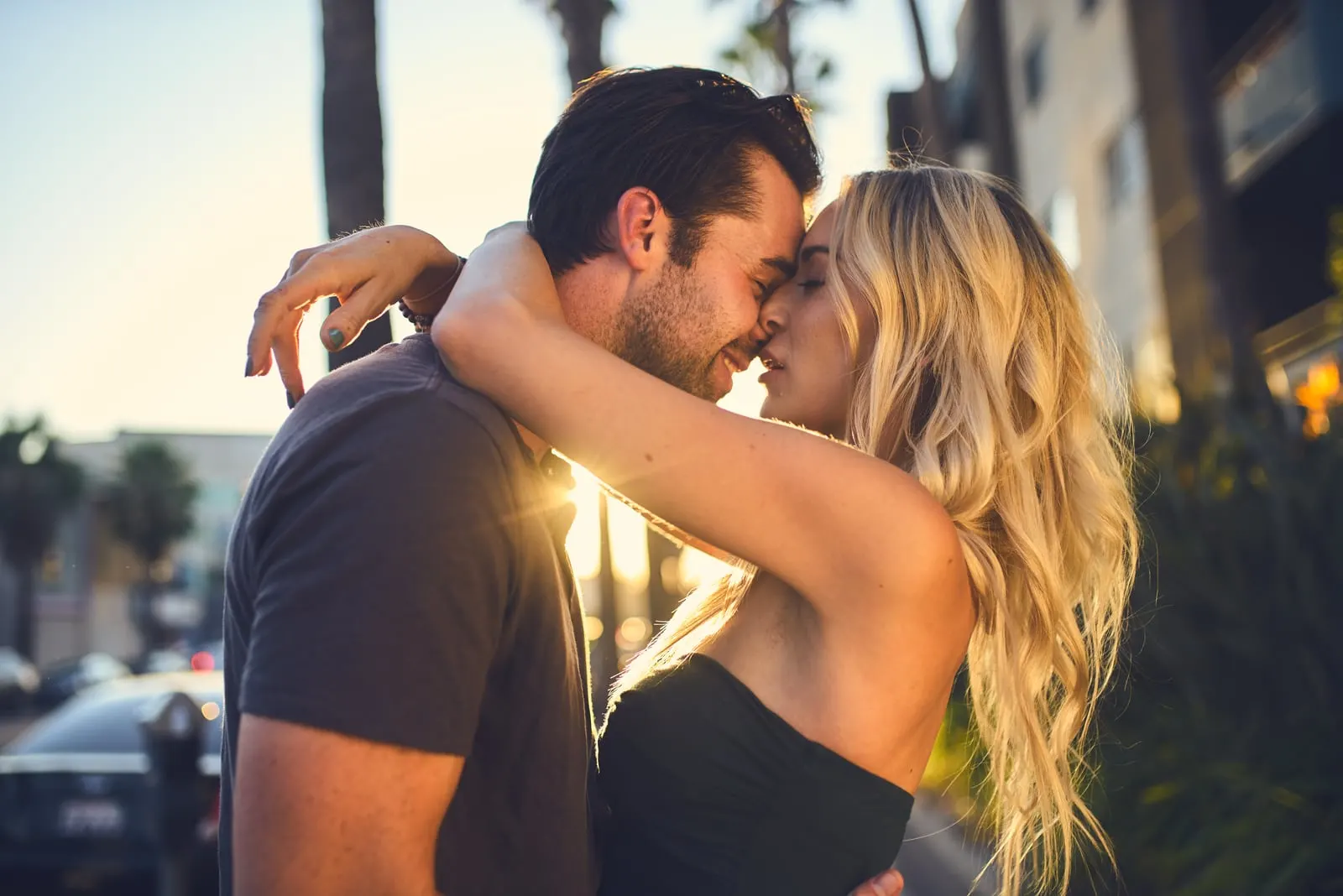 lovely couple hugging outside