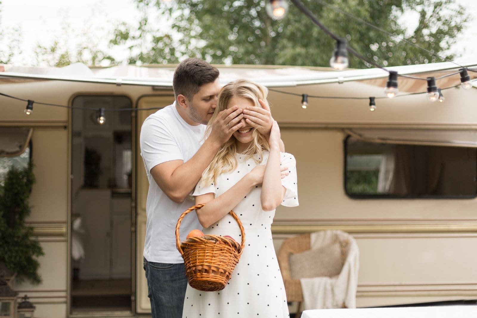 sweet couple travelling on the bus standing outside