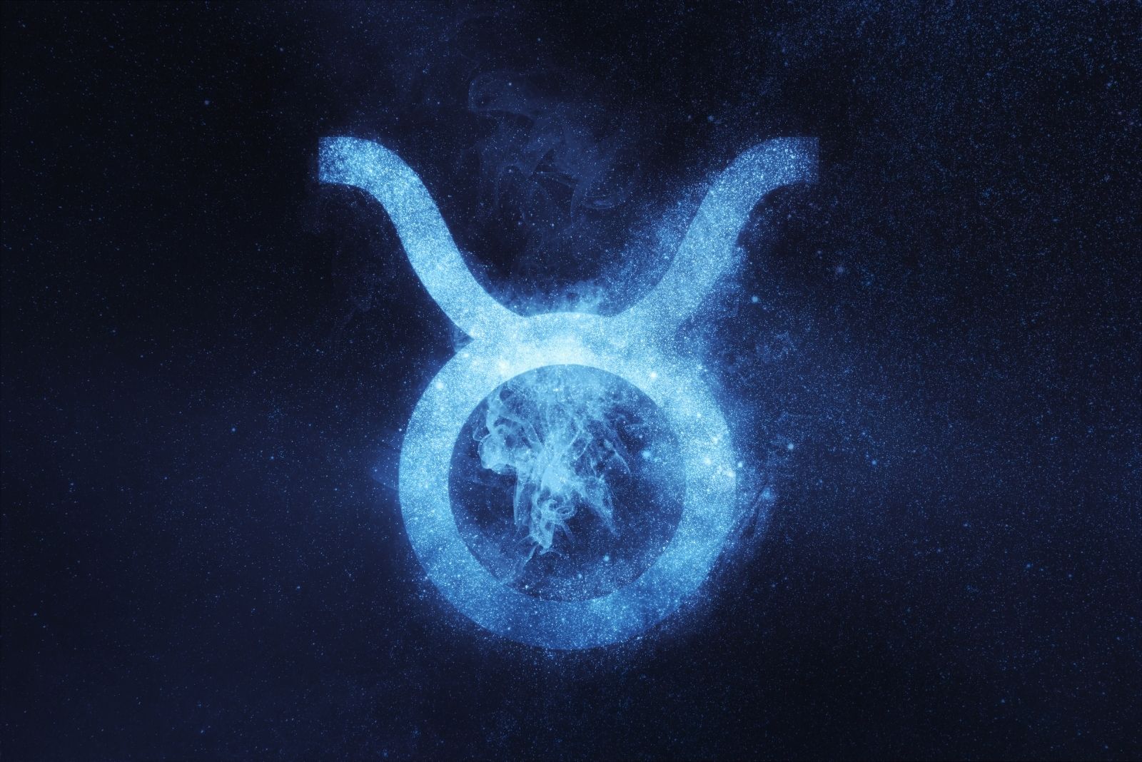 taurus zodiac sign with abstract night sky background