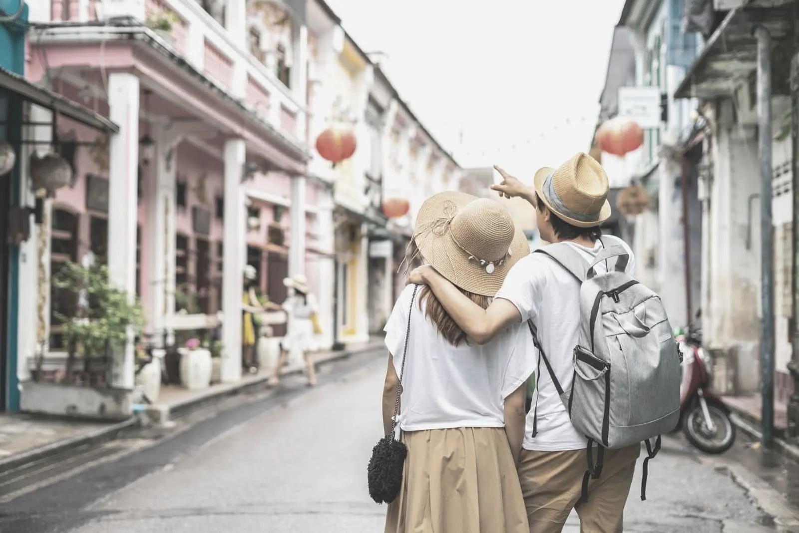 young couple traveller walking at Phuket old town in Thailand