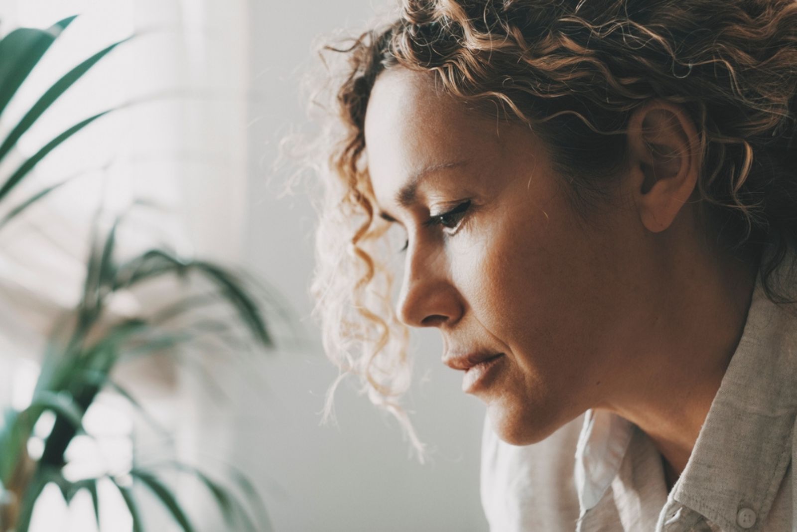 serious woman staring at floor