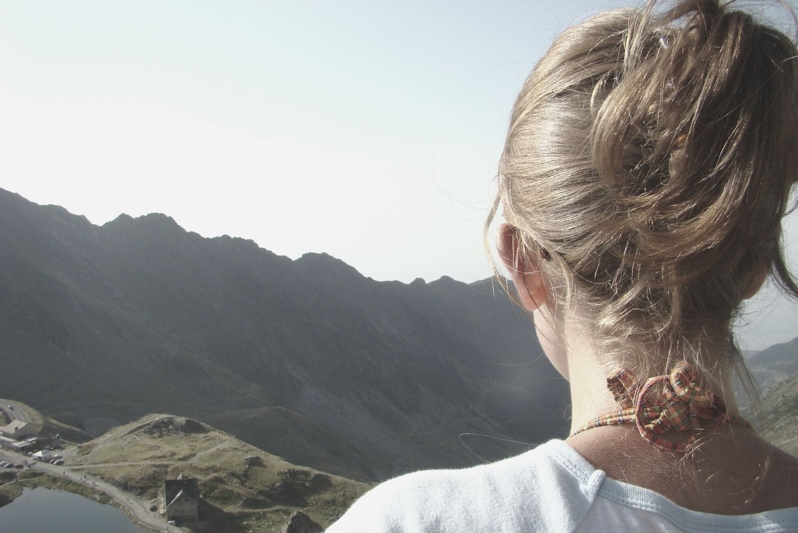 female hikers backview in close up looking at the mountains 