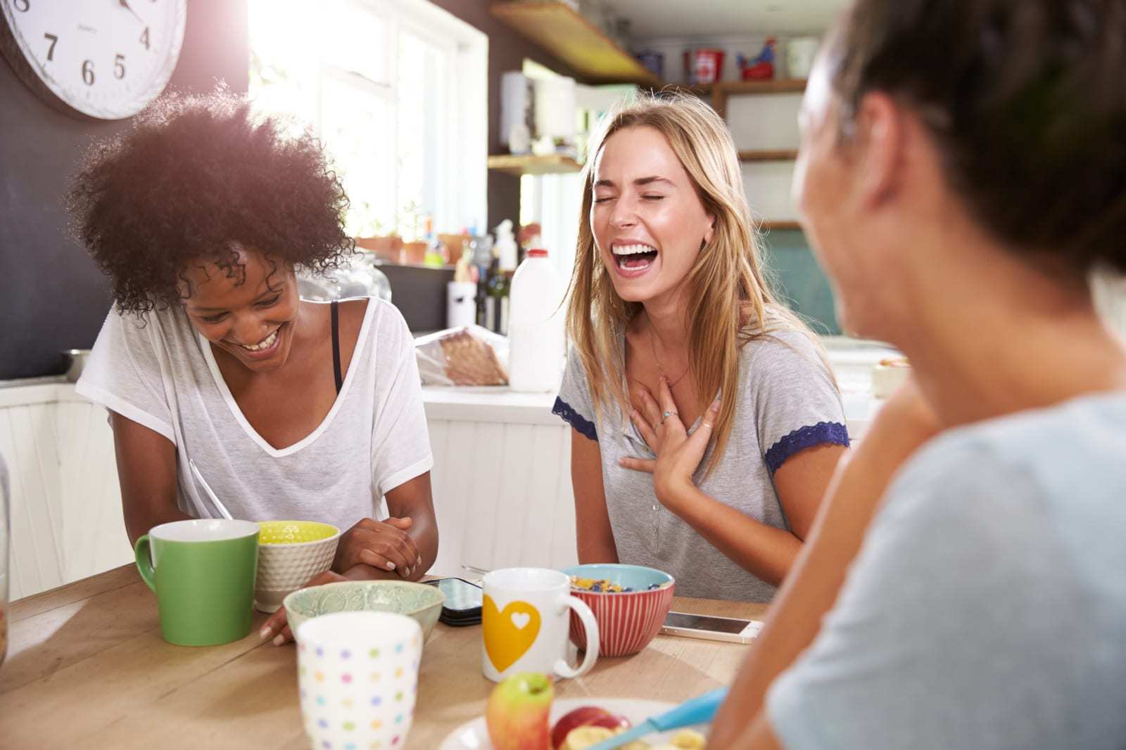 three girls smiling