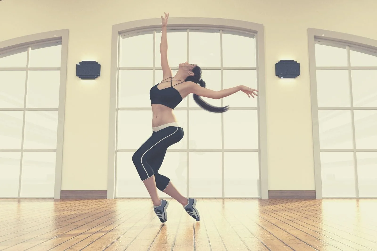 woman dancing freestyle alone inside a dance studio