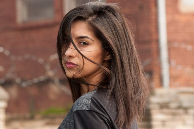 a determined woman looks over her shoulder