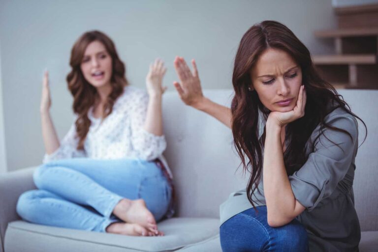 friends are arguing on the couch