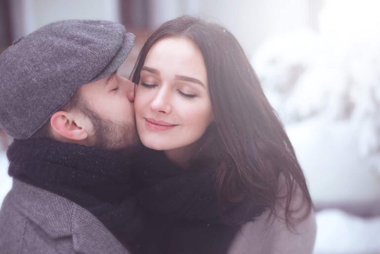 a couple in love hugging outside