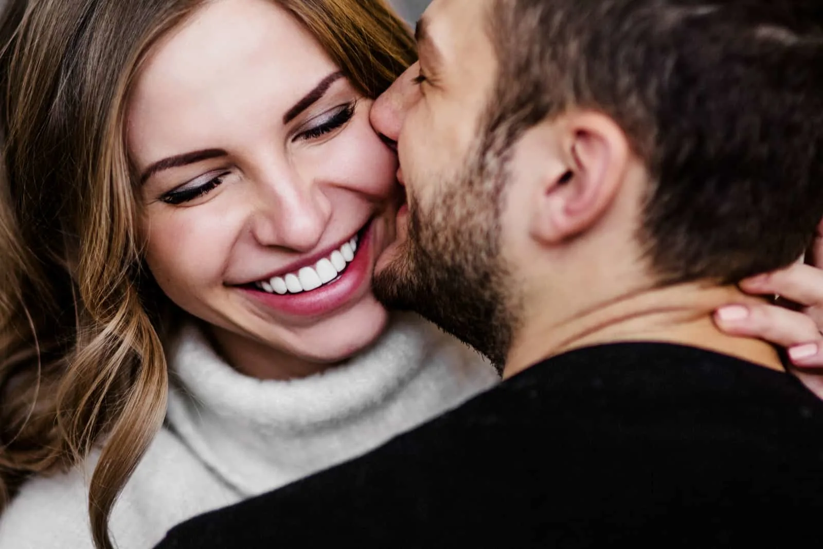 Young couple in love hugging each other