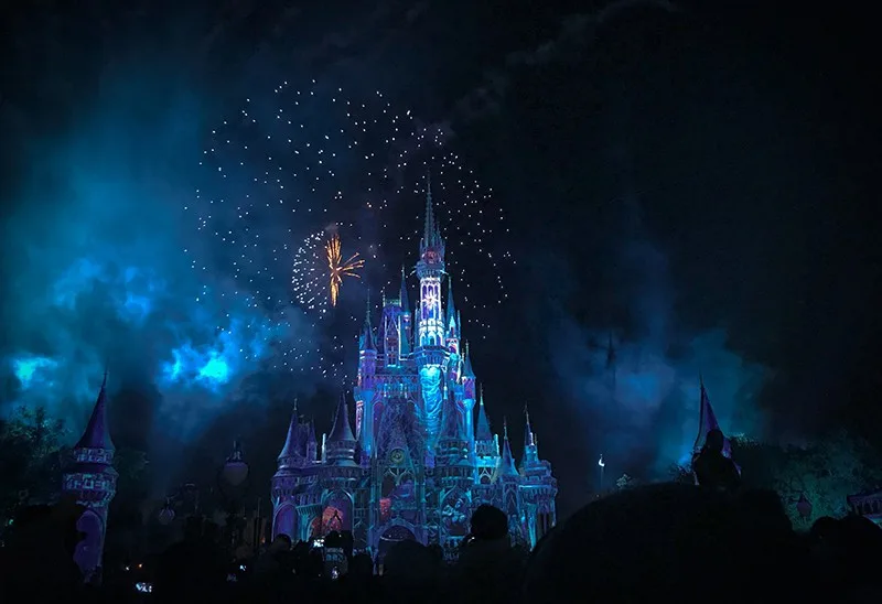 Disney crystal castle surrounded with fireworks
