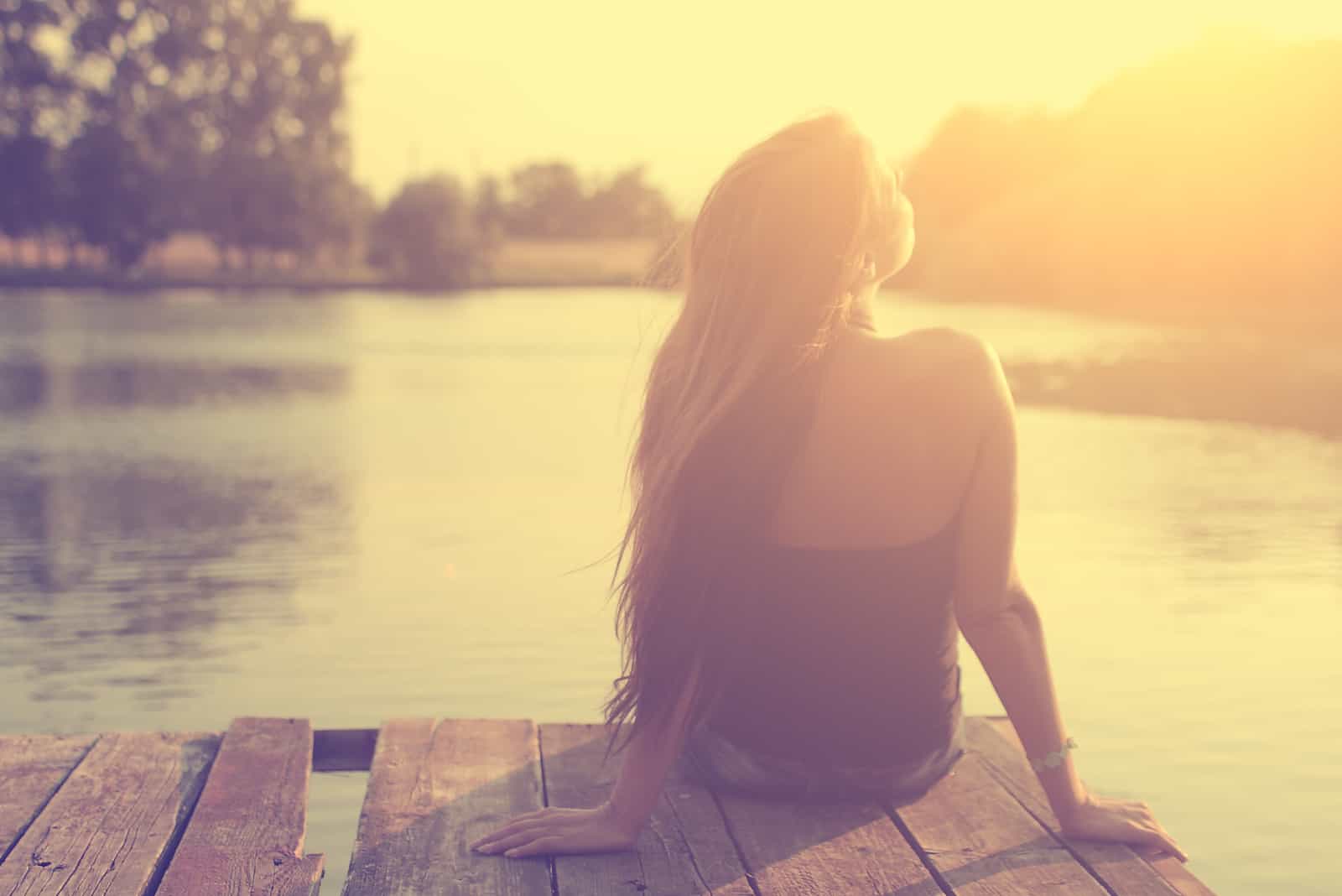 relaxing young woman in nature