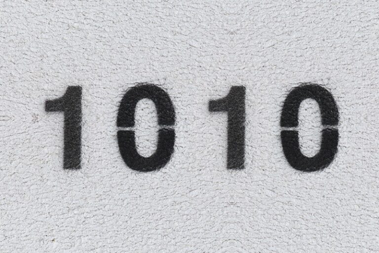 Black Number 1010 on the white wall